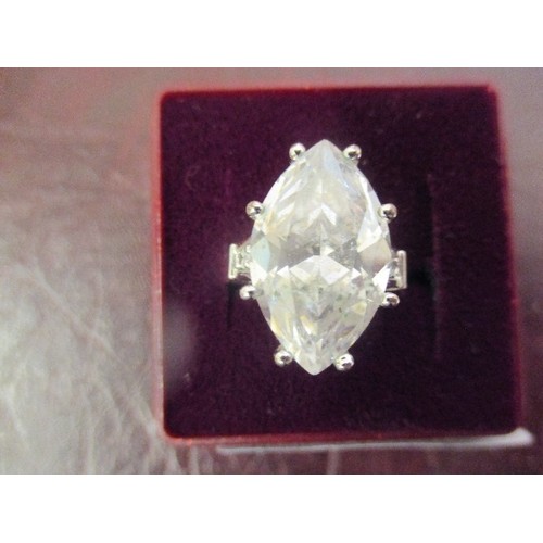 20 - A RING WITH LARGE WHITE STONE SIZE O