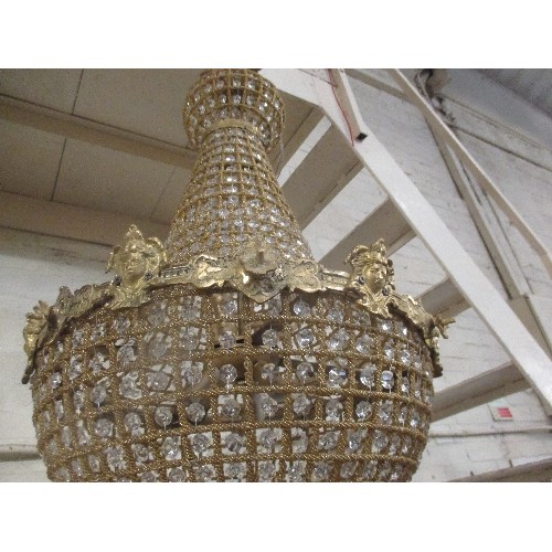 179 - LARGE FRENCH STYLE CRYTSAL CHANDELIER - HOLDS 6 X BULBS - ORMOLU BAND WITH MASK HEADS - 50CM DIA - 8... 