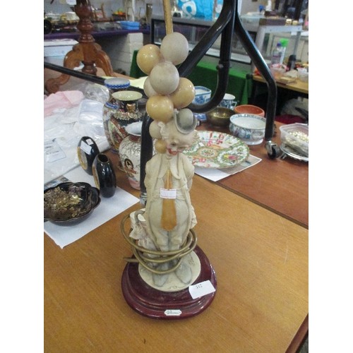 312 - CLOWN WITH BALLOONS-TABLE-LAMP, IN CAPODIMONTE RESIN, SIGNED G. ENURDUI. CREAM SHADE.