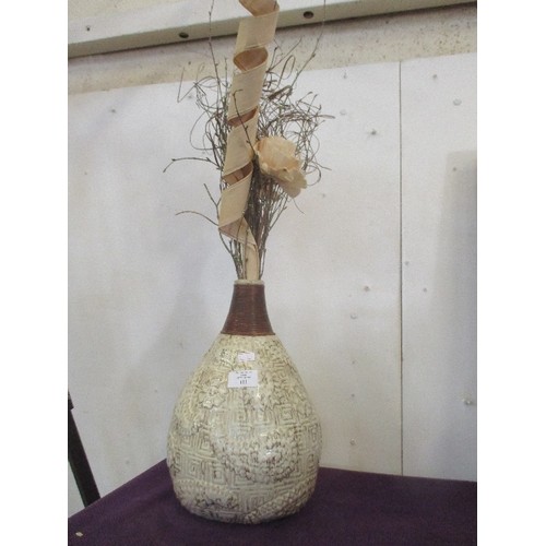 104 - LARGE GLAZED EARTHENWARE VASE WITH DRIED TWIGS. TEARDROP SHAPE.