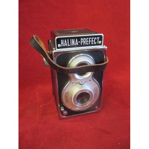 79 - HAKING'S HALINA PREFECT REFLEX TYPE CAMERA. MODEL 103. TAKES 12 PICTURES ON 120 FILM. ORIGINAL BOX.