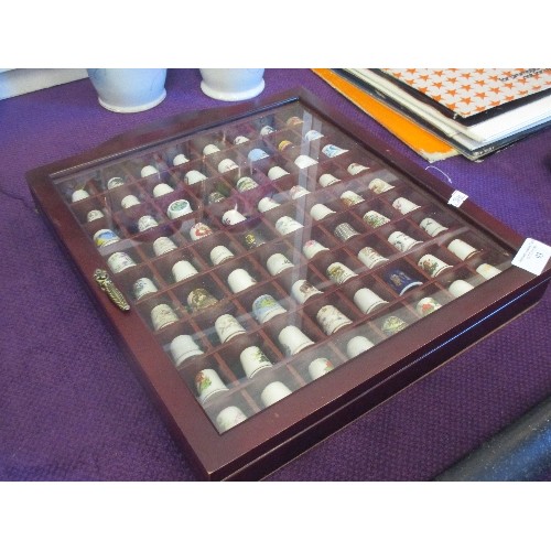 93 - COLLECTABLE THIMBLES X 72, IN A GLASS DISPLAY CABINET. CAN BE WALL MOUNTED.