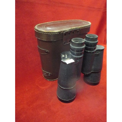 110 - VINTAGE BINOCULARS. SKYBOLT, COATED OPTICS. IN LEATHER CASE.