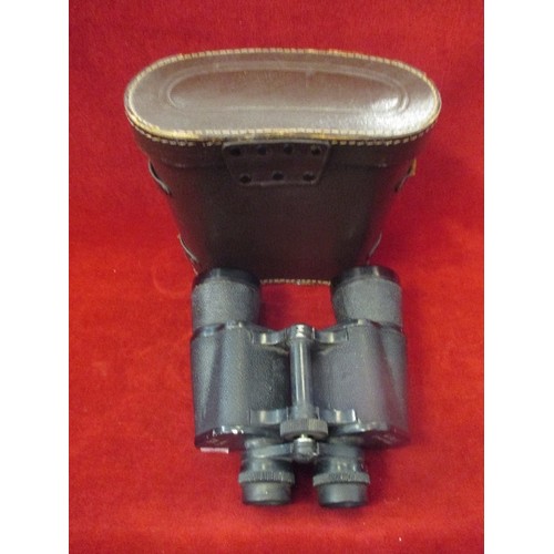 110 - VINTAGE BINOCULARS. SKYBOLT, COATED OPTICS. IN LEATHER CASE.