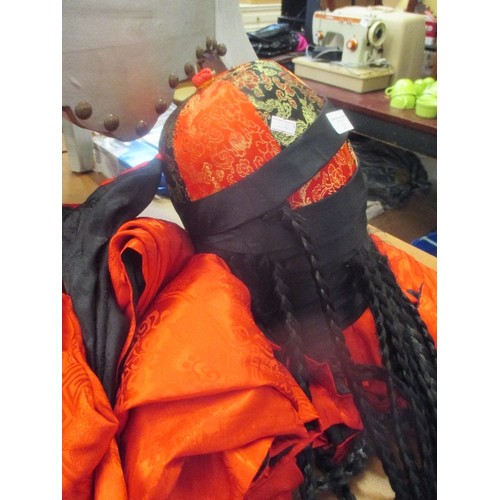 211 - QUANTITY OF CHINESE COSTUMES. RED & BLACK 'SATIN' TUNICS, AND BLACK, RED & GOLD HATS WITH ATTACHED P... 