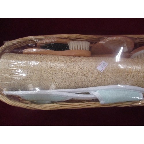 209 - BRAND-NEW/PACKAGED SHOWER/BATH SET IN A BASKET. INC LOOFER, SLIPPERS, VARIOUS BRUSHES ETC.