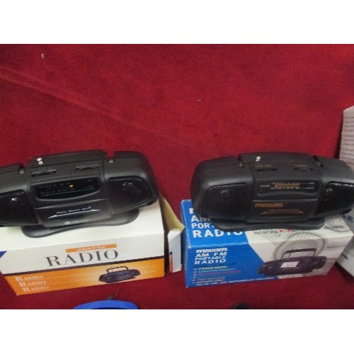 214 - BRAND-NEW-BOXED RADIOS, INC RADIO ALARM, & A HANDS-FREE MOBILE PHONE CAR KIT.