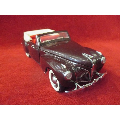 7 - A FRANKLIN MINT DIE CAST 1:24 SCALE MODEL OF A 1941 LINCOLN CONTINENTAL WITH CERTIFICATE AND PAPERWO... 