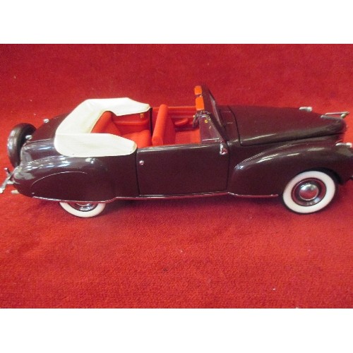 7 - A FRANKLIN MINT DIE CAST 1:24 SCALE MODEL OF A 1941 LINCOLN CONTINENTAL WITH CERTIFICATE AND PAPERWO... 