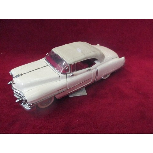 10 - A FRANKLIN MINT 1:24 SCALE DIE CAST MODEL OF A 1953 CADILLAC ELDORADO WITH CERTIFICATE AND LEAFLETS