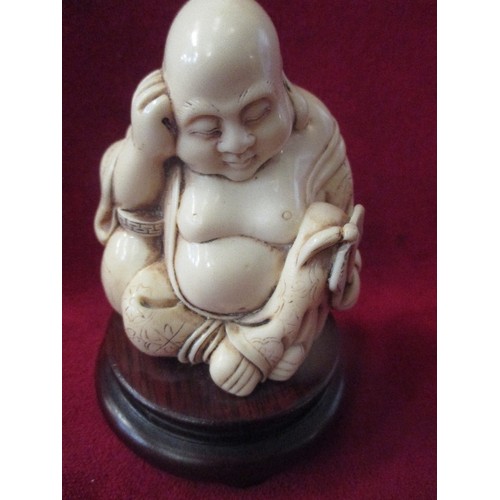 150 - VINTAGE CARVED HARDWOOD SEATED BUDDHA - 15CM AND A 20TH CENTURY RESIN BUDDHA ON A WOODEN STAND