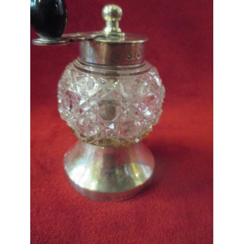 132 - A VICTORIAN STERLING SILVER AND CUT GLASS PEPPER GRINDER, LONDON 1889, MAKER HUKIN & HEATH. THE GRIN... 