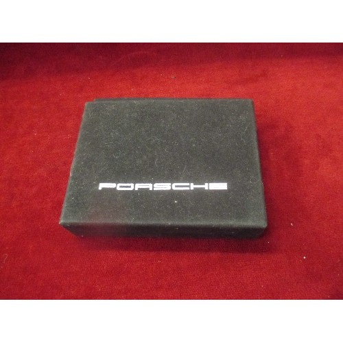 309 - A MINT SET OF PORSCHE PLAYING CARDS - 2 DECKS . SEALED IN PACKAGING, IN ORIGINAL BOX WITH BRIEF HIST... 