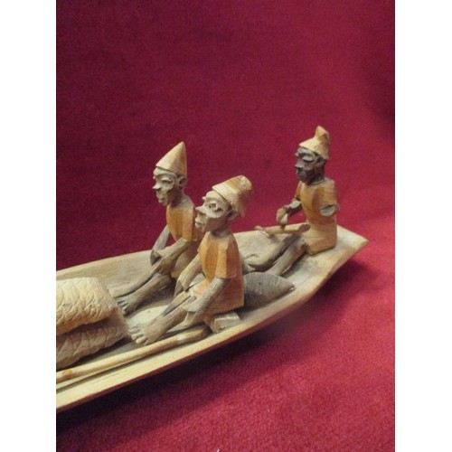 9 - AN INTERESTING 20TH CENTURY AFRICAN  HAND CARVED WOODEN CANOE WITH 10 FIGURES WITH PRODUCE - SACKS A... 