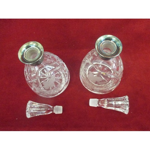 340 - A PAIR OF GOOD QUALITY CUT AND ETCHED GLASS SPIRIT DECANTERS WITH 830 SILVER COLLARS MARKED KRONEN D... 