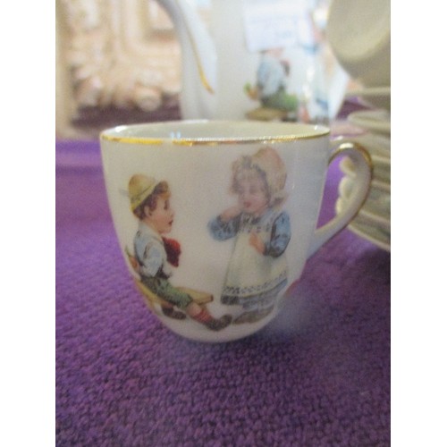 249 - AN EDWARDIAN PERIOD GERMAN PORCELAIN NURSERY TEA SET WITH DIFFERENT DESIGNS OF CHILDREN PLAYING. INC... 