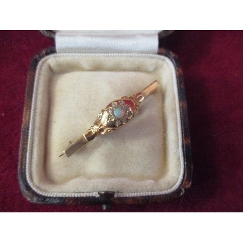 25 - A VERY PRETTY ANTIQUE BAR BROOCH SET WITH A BEAUTIFUL FIRE OPAL SURROUNDED BY DIAMOND CHIPS. PROBABL... 