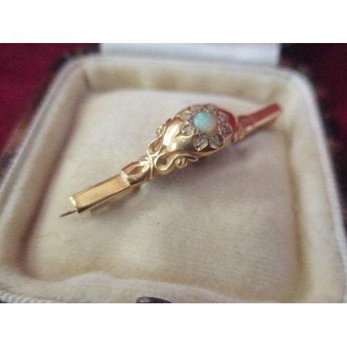 25 - A VERY PRETTY ANTIQUE BAR BROOCH SET WITH A BEAUTIFUL FIRE OPAL SURROUNDED BY DIAMOND CHIPS. PROBABL... 