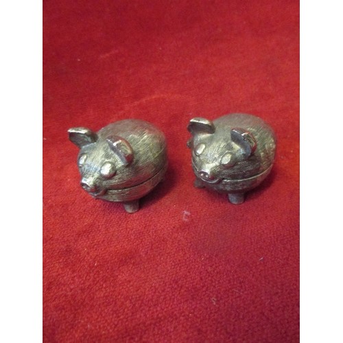 66 - PAIR OF SILVER PLATED PIG SALT CELLARS. AND A PIG BOTTLE STOPPER