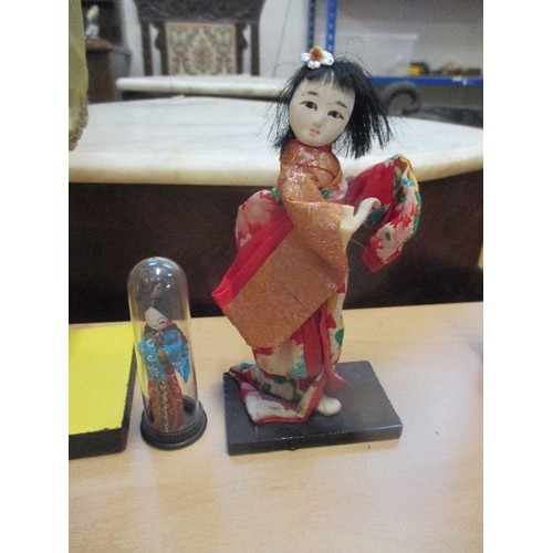 370A - INDIAN COSTUME DOLL AND TWO JAPANESE DOLLS, THE SMALLEST UNDER A DOME