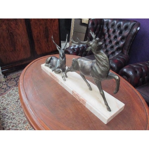 210 - AN IMPRESSIVE 1930'S FRENCH ART DECO PERIOD GROUP OF TWO STAGS - IN BRONZED METAL ON A HEAVY MARBLE ... 