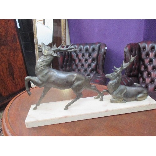 210 - AN IMPRESSIVE 1930'S FRENCH ART DECO PERIOD GROUP OF TWO STAGS - IN BRONZED METAL ON A HEAVY MARBLE ... 