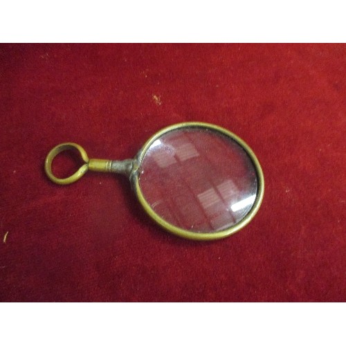 25 - ANTIQUE MAGNIFYING 