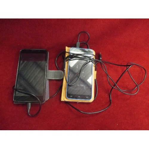 21 - TWO MOBILE PHONES WITH TOUCH  SCREENS, CASES AND LEADS