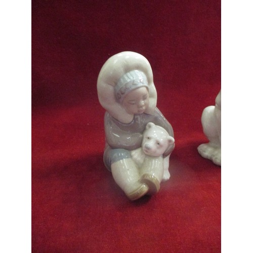 1 - THREE PORCELAIN FIGURES, TWO BY LLADRO OF AN INUIT WITH POLAR BEAR CUB A POLAR BEAR (12CM H) AND THE... 