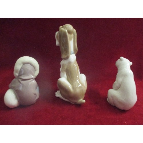 1 - THREE PORCELAIN FIGURES, TWO BY LLADRO OF AN INUIT WITH POLAR BEAR CUB A POLAR BEAR (12CM H) AND THE... 