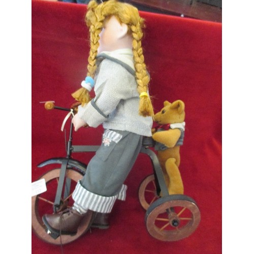 105 - COLLECTORS DOLL 'ABBEY' ON TRICYCLE WITH TEDDY BEAR HANGING ON THE BACK