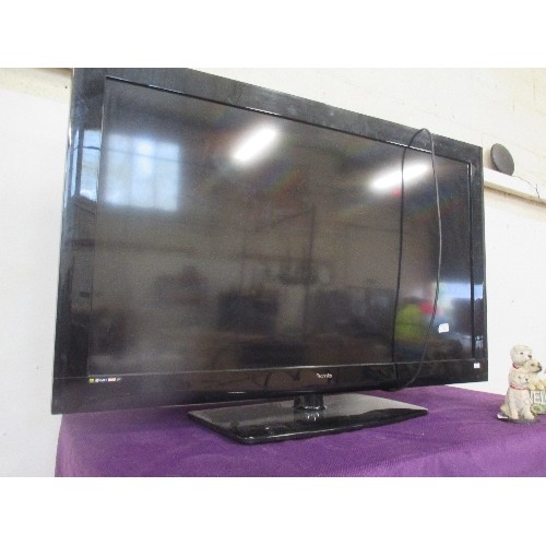 94 - LARGE FLAT SCREEN TELEVISION BY TECHNIKA - 46 INCH SCREEN