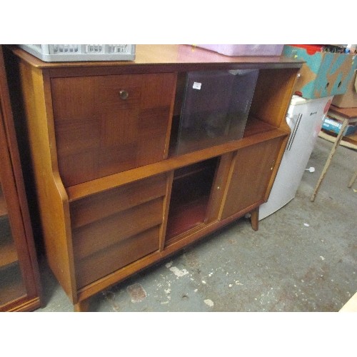 267 - MID CENTURY TEAK SIDEBOARD WITH DROP DOWN CABINET, GLASS SLIDING DOORS, CUTLERY DRAWER - ON SPLAYED ... 