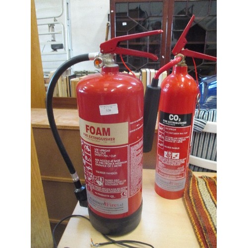 320 - A FOAM FIRE EXTINGUISHER (6 LITRE) AND A CO2 (2 KILOGRAM) FIRE EXTINGUISHER - BOTH TESTED DECEMBER 2... 