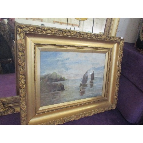 345 - EARLY 20TH CENTURY OIL PAINTING ON CANVAS OF TWO SMALL SAILING BOATS JUST OFF THE COAST - INDISTINCT... 