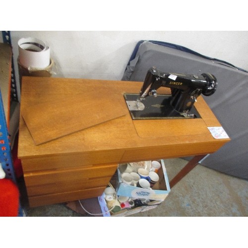 368 - ELECTRIC SINGER SEWING MACHINE IN SEWING TABLE WITH DRAWERS  - NOTE FRONT LEG IS DETACHED AND NEEDS ... 