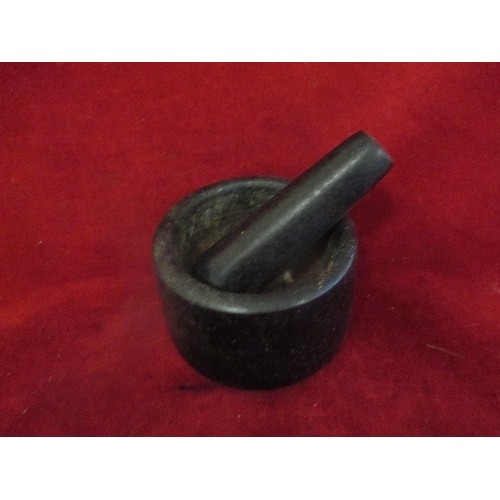 72 - HEAVY BLACK PESTLE AND MORTAR.