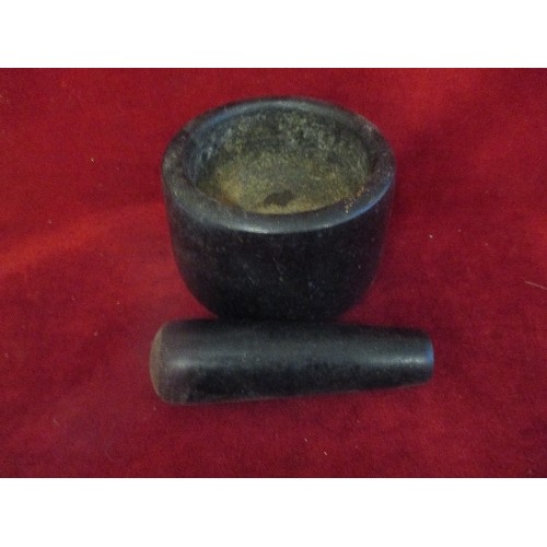 72 - HEAVY BLACK PESTLE AND MORTAR.