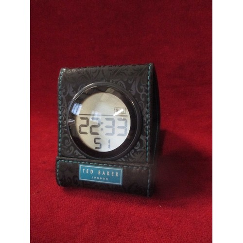 116 - TED BAKER TRAVEL CLOCK IN BLACK 'WALLET. APPEARS NEW.