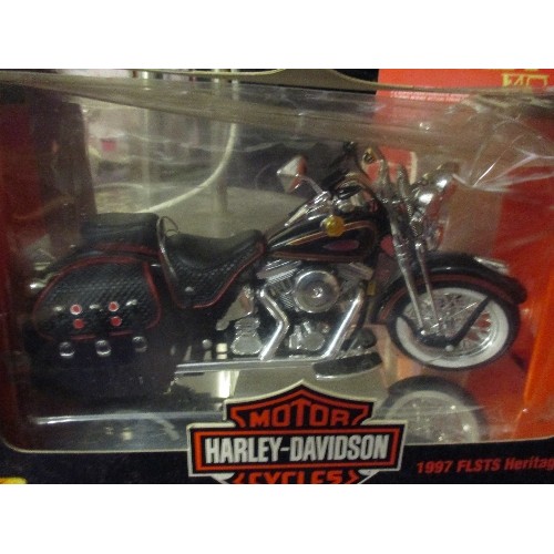 193 - HARLEY DAVIDSON COLLECTORS MODEL MOTORCYCLE. 1/10 SCALE. 1997 FLSTS HERITAGE SPRINGER. APPEARS BRAND... 