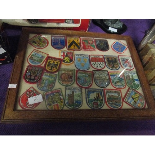 195 - VINTAGE CLOTH BADGES, GERMANY, BELGIUM AND HOLLAND THEMED. DISPLAYED IN A VINTAGE WOODEN GLAZED FRAM... 