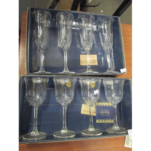 333 - TWO BOXES OF WINE GLASSES AND CHAMPAGNE FLUTES BY CAPRI CRYSTAL - BOXED