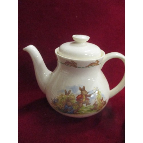 4 - 4 PIECES OF DOULTON BUNNYKINS CHINA INCLUDING A TEAPOT, CHILDS PLATE, JUG AND BOWL -WITH A GIFT COLL... 