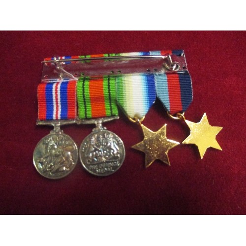 14 - SET OF MINIATURE WW2 MEDALS INC THE DEFENCE MEDAL, WAR MEDAL, ATLANTIC STAR AND 1939-45 STAR IN ORIG... 