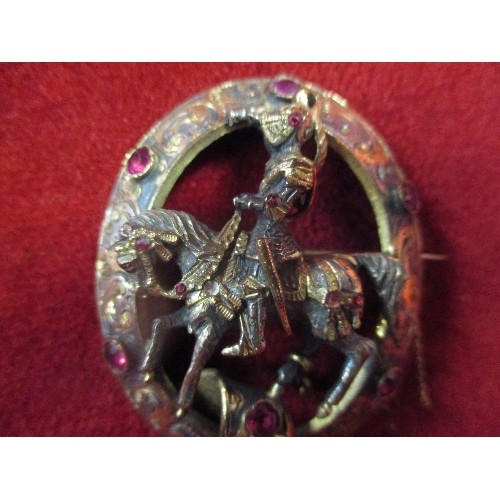 53A - A LARGE VICTORIAN BROOCH GOLD PLATED WITH RED STONES A KNIGHT ON HORSE BACK