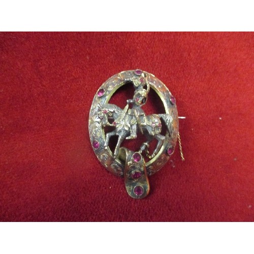 53A - A LARGE VICTORIAN BROOCH GOLD PLATED WITH RED STONES A KNIGHT ON HORSE BACK