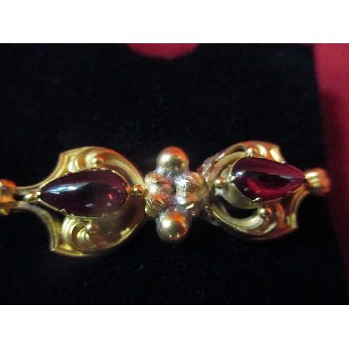 53B - A 14ct GOLD VICTORIAN BROOCH WITH TWO TEARDROP GARNETS UNMARKED GOLD TESTED 4.85G