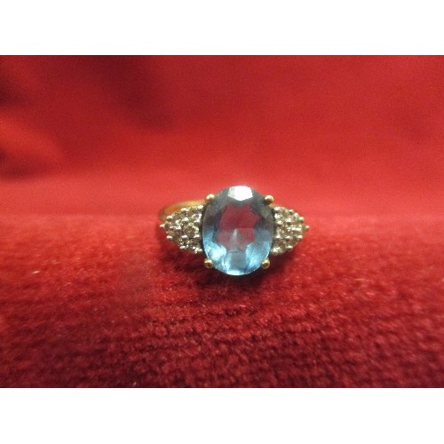 17D - 9CT GOLD RING WITH LARGE LIGHT BLUE SAPPHIRE AND 12 DIAMONDS RING WEIGHT 2.74G  SIZE M