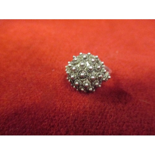 15F - A HIGH GRADE (950) SILVER RING ENCRUSTED WITH INTRICATE FLOWER CLUSTER DESIGN - PROBABLY INDIAN - 4.... 