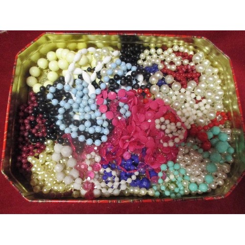 53C - A TIN CONTAINING LOVELY SELECTION OF COLOURFUL BEAD NECKLACES - SIMULATED PEARLS ETC